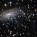 Webb Telescope Spots Possible Jellyfish Galaxy 12 Billion Light-Years Away